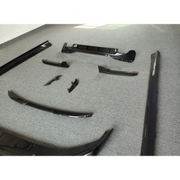 Kit de carrosserie amélioré de style AD en fibre de carbone sèche, comprenant une lèvre avant, des jupes latérales, un diffuseur arrière, un aileron arrière et des éléments décoratifs de garde-boue, pour BMW G30 G38