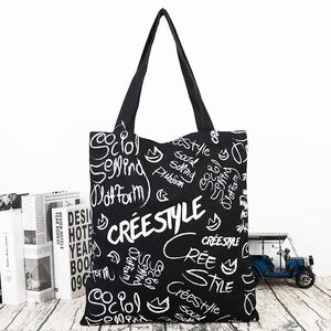 Sacs fourre-tout en toile de coton écologique noir, personnalisables avec logo, naturels et vierges - Product Image 2