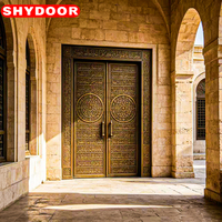 Porte d'entrée principale de villa de luxe, style mosquée arabe, en cuivre antique sculpté, double porte de sécurité islamique