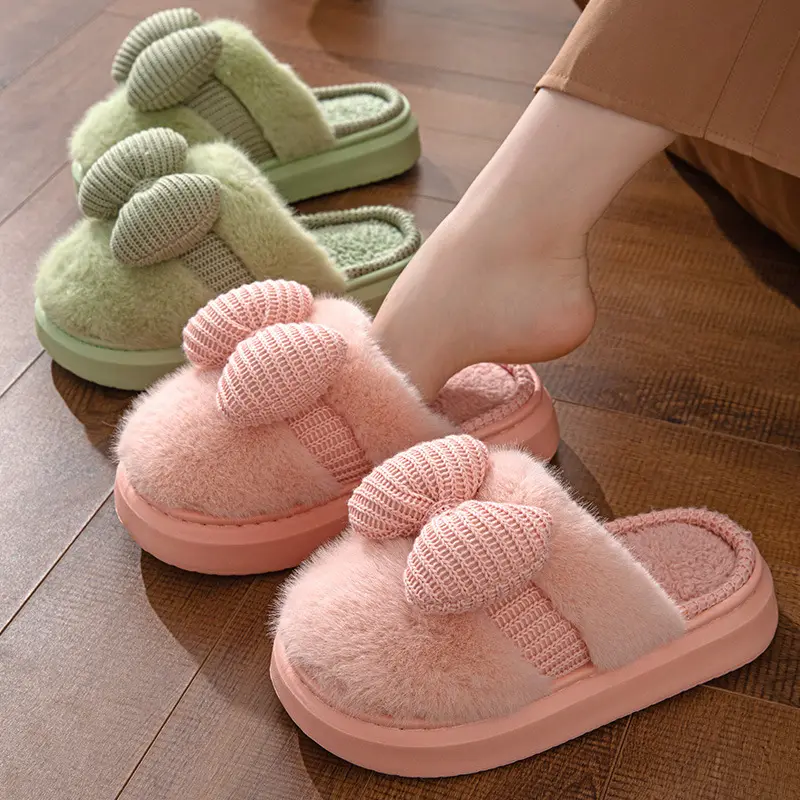 มาใหม่ฤดูหนาวรองเท้าแตะผ้าฝ้ายแฟชั่น Bowknot Flip-Flops หนาตุ๊กตาร้อนรองเท้าแตะห้องนอนสําหรับผู้หญิงขายส่ง