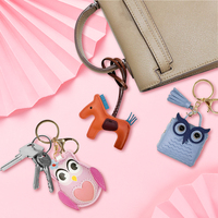 Nouveauté : Mini porte-monnaie hibou en cuir raffiné avec pompon, porte-clés hibou en cuir, ornements et breloques pour sacs à main en cuir PU