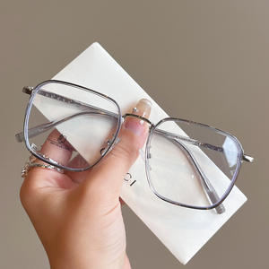 Montura de Gafas Rectangulares Coco Optical Extra Anchas con Protección Anti Luz Azul para Mujer, Lentes de Acero Inoxidable TR, Puente Mediano - Product Image 1