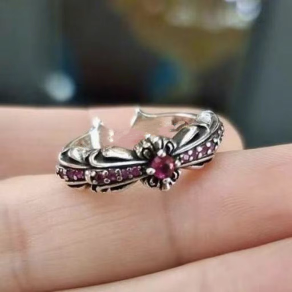 Croix de diamant rose