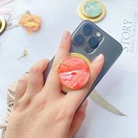 Support de coque ronde de bureau rétractable de téléphone magnétique de Phnom Penh de pétoncle naturel portatif