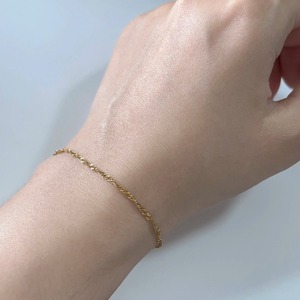 สร้อยข้อมือสแตนเลสสตีลบางลายคลื่นน้ำ ชุบทอง 18K สร้อยข้อเท้าแบบเรียบง่าย ดีไซน์สวยงาม สำหรับผู้ชายและผู้หญิง - Product Image 6