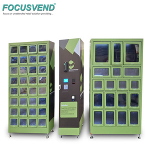 Distributeur automatique double usage pour snacks et produits intimes avec système de paiement par pièces, incluant des fonctions café et ascenseur - Product Image 1
