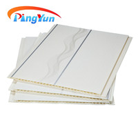 Panneau mural décoratif intérieur durable Panneau de plafond léger en PVC Panneau de plafond en grain de bois
