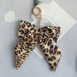 Autumn and Winter Leopard Print Bow Keychain Korean Style Fabric & Metal Ribbon Bag Pendant Creative <b>Car</b> - Product Image 6
