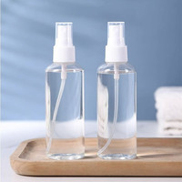 Vente en gros de flacons pulvérisateurs cosmétiques en plastique PET de 100 ml avec pompe pulvérisatrice et impression sérigraphique, brume fine