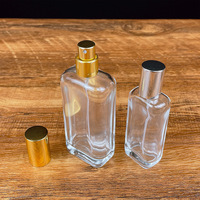 Venta al por mayor directa de fábrica: Botella de vidrio ámbar mate cuadrada de 30ml/50ml/100ml para aceite de perfume con boquilla personalizada serigrafiada