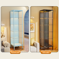 Vitrine moderne en verre transparent sur pied avec éclairage pour figurines et modèles de jouets, pour le rangement - Utilisation domestique dans le salon