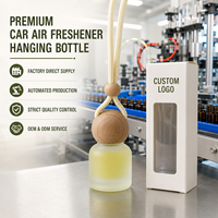 Diffuseur de parfum pour voiture rechargeable à suspendre, flacon en verre givré, bouchon en bois sphérique, 60% de parfum, longue durée