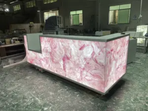 Conception de barre d'éclairage led de boîte de nuit à surface solide moderne avec pierre rose
