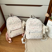 Sac à dos pour filles à l'aspect élégant et tendance, imprimé en dentelle, avec pendentif en peluche détachable, pour l'école et l'usage quotidien