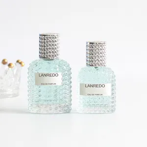 Fantezi kabartmalı kristal 100ml dubai cam parfüm şişeleri boş kozmetik şişeleri vidalı sprey