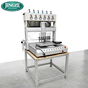 Machine de distribution CNC à 6 têtes et 6 couleurs, haute performance pour étiquettes en silicone et porte-clés - Product Image 1