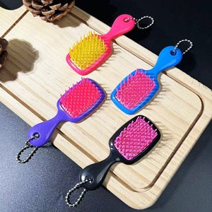 Nuovo Pettine Massaggiante a Nido d'Ape in ABS, Impermeabile UV, Stile Creativo Europeo e Americano, Ciondolo Portachiavi - Product Image 2