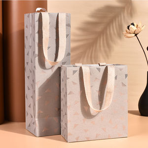 Bolsas de Papel Impresas con Logotipo Personalizado, Fabricante de Bolsas de Regalo al por Mayor con Asa para Comercios o Eventos - Product Image 1