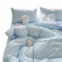 Ensemble de literie quatre pièces en polyester à motif géométrique uni, style Instagram, directement de l'usine ; Housse de couette et draps pour lit simple, idéal pour l'été