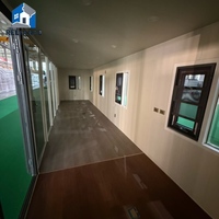 RELYANCE Cabine Apple de 40 pieds de large avec escalier en colimaçon, terrasse et mur en matériau PU, idéale pour villa, bureau, immeuble, salon, glamping