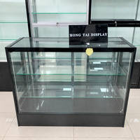 Vitrine de présentation de tabac de luxe moderne en aluminium verrouillable avec porte en verre trempé et éclairage LED, robuste, pour la vente au détail