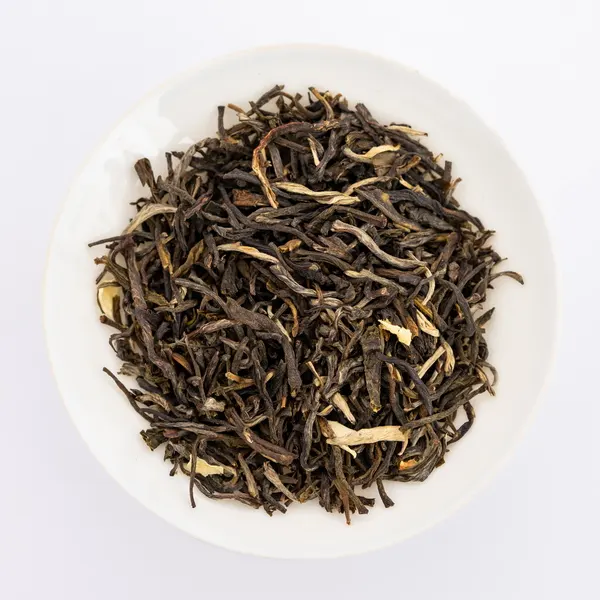 Té de China Precio de fábrica Té verde de jazmín Hojas sueltas Té de jazmín con sabor a naranja Pekoe