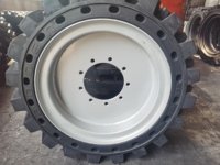 Reifen für Baggerlader: Pannensichere Vollgummireifen mit Felge 12-16.5 33x12-20 250-15 für JLG Hubarbeitsbühnen 450AJ