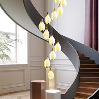 Lustre LED en spirale en céramique de luxe, en forme de bourgeon de fleur, longue suspension pour villa, duplex, plafond haut