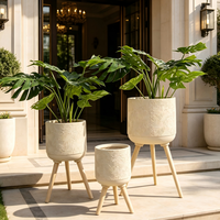 Ensemble de pots à plantes en fibre d'argile de 3 tailles, design minimaliste moderne avec pieds en bois naturel, utilisation intérieure/extérieure pour les plantes de la maison et du jardin