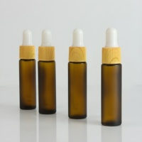 Flacon compte-gouttes en verre ambré dépoli de 10 ml, 20 ml, 30 ml, résistant à la moisissure, avec bouchon imitation bois par transfert d'eau, vente en gros usine