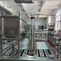Machine automatique de remplissage et de scellage de pâte de viande pour animaux de compagnie en trois couleurs pour barquettes en aluminium