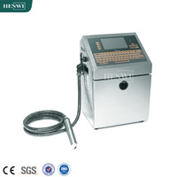 Machine de codage d'impression d'encre Henwi imprimante à jet d'encre automatique de buse industrielle pour la date d'expiration numérique de poche de carton de bouteille d'oeufs
