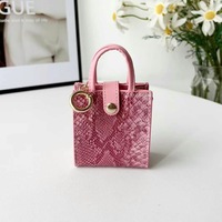 Nouvelle pochette à monnaie en cuir PU, nouveau sac pendentif, étuis à rouge à lèvres, sac pour écouteurs et clés de voiture, mini porte-monnaie, porte-clés en cuir