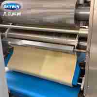 Ligne de production multifonctionnelle contrôlée par PLC pour la fabrication de biscuits, machine à fabriquer des biscuits mous