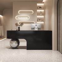 Comptoir de réception incurvé de luxe sur mesure, salon de beauté, noir et blanc, MDF, comptoir de caisse, comptoir d'accueil pour boutique de mode, magasin de vêtements
