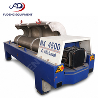 Décanteur séparateur à cuve Laval 450 mm Alfa DFNX4565 d'occasion, économique, pour la clarification des liquides de fermentation alimentaire et d'huile