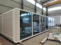 Maison conteneur mobile en verre avec structure en acier, étanche, facile à installer, pour bureau extérieur, loisirs et voyages