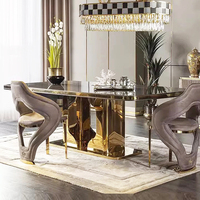 Ensemble de table à manger moderne de luxe élégant avec plateau en marbre doré, 6/8/10 places, table et chaises haut de gamme dorées pour villa