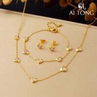 Vente en gros d'usine, collier, bracelet et boucles d'oreilles en acier inoxydable plaqué or 18 carats, motif trèfle, fleur, cœur, ensemble de bijoux pour femmes, usage quotidien