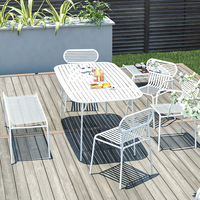 Ensemble table et chaises de jardin en fer forgé de style moderne et épuré pour balcons, cours, jardins, cafés et salons de thé