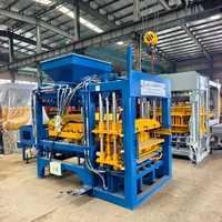 Machine à fabriquer des briques produisant des blocs de maçonnerie en béton creux standard, fiable, QT4-15, entièrement automatique