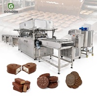 Machine de production de biscuits et de mini-beignets manuelle, pour le refroidissement des biscuits, le recouvrement de fruits secs et la enrobage au chocolat, à vendre