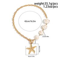 Collier à breloques plaqué or avec pendentifs en coquillages naturels, étoiles de mer et perles de la collection Oceanic – Vente en gros de bijoux de mode – Choix populaire