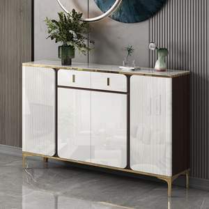 Aparador moderno minimalista con molduras doradas y puertas blancas para almacenamiento en la cocina - Product Image 3