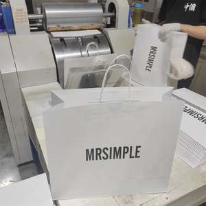 KM Custom Kraft Paper Grocery Shopping Tote Bag with logo Promotional Blank Clothes Packaging and Paper <b>Gift</b> Bags - Product Image 1