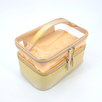 Sac cosmétique carré en PVC transparent avec garniture en cuir PU doré, fermeture éclair et poignée, organiseur de maquillage de voyage