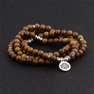 Bracciale Mala Tibetano Buddista con 108 Perle in Legno Multistrato con Charm Om per Uomo e Donna - Product Image 2