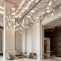 Lustre LED en cristal géométrique de luxe sur mesure, directement de l'usine, pour l'installation de projets dans les halls d'hôtel, les bureaux de vente et les espaces artistiques