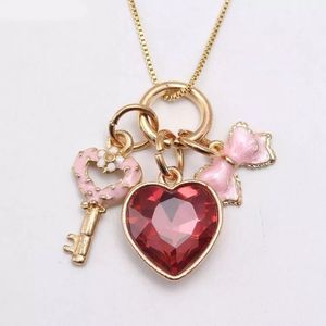 2025 nuevos collares de esmalte chapados en oro para niños, collares con colgante de corazón de girasol arcoíris con llave dulce para niños - Product Image 4