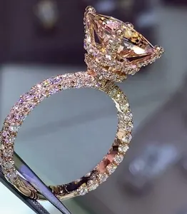 促销时尚玫瑰金电镀香槟锆石结婚戒指女性饰品